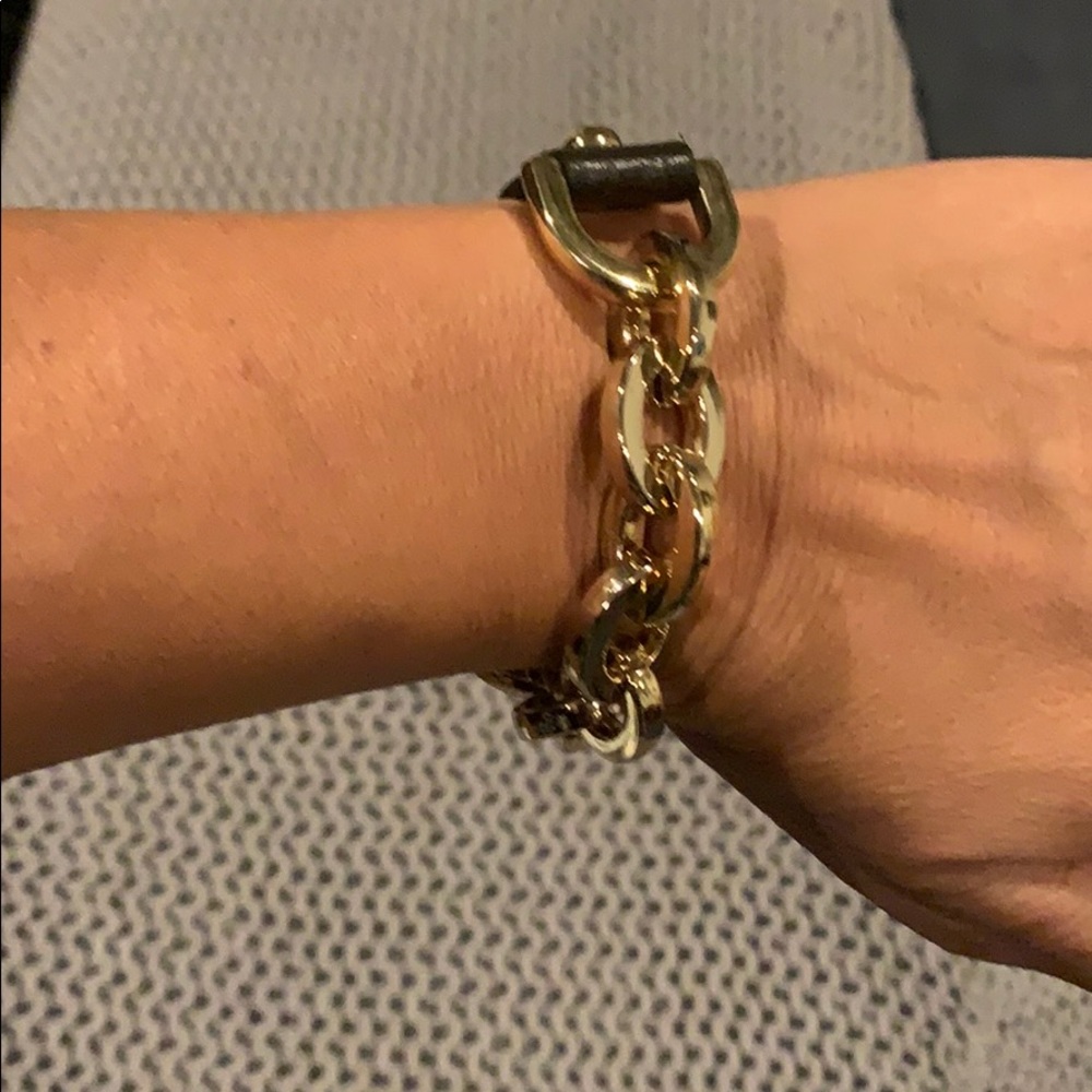 Gold chain and brown  bracelet